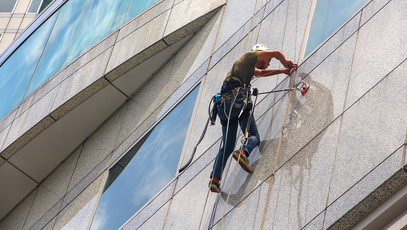 Man cleaning window service-6